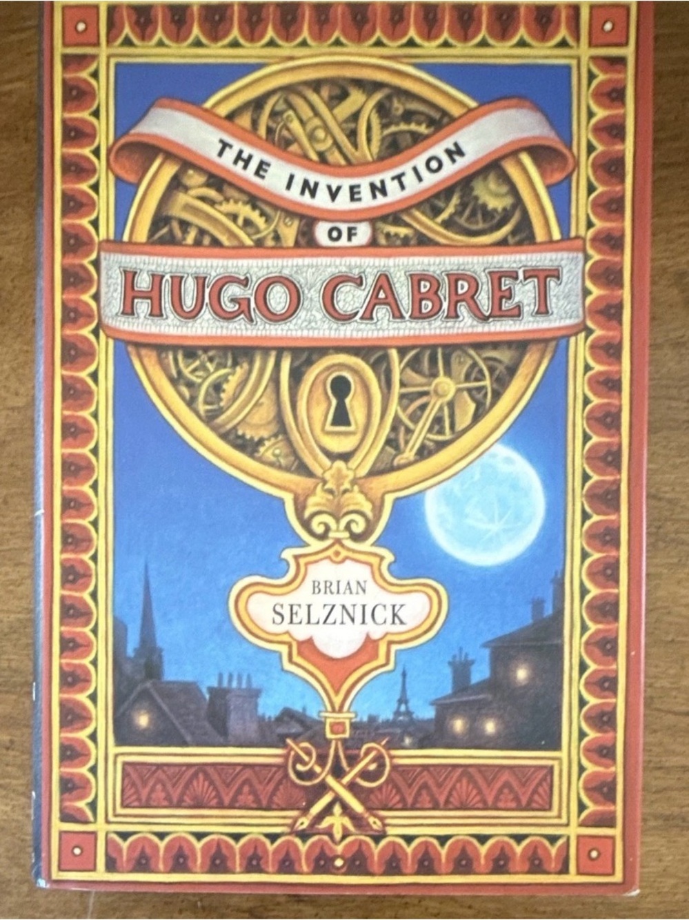 The Invention of Hugo Cabret Hardcover Book - Blue/Red